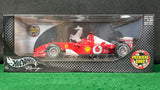 ferrari_f2002_n_1_schumacher__by_hotwheels_1-18_(54643)-1_at_albaco.com