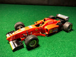 ferrari_f1_f310_schumacher_n_1_by_bburago_1-24_(6501)(no_box)-1_at_albaco.com