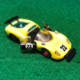 ferrari_206_dino_sport_n_23_yellow/black_by_corgi_toys_1-43_(344)(no_box)-1_at_albaco.com